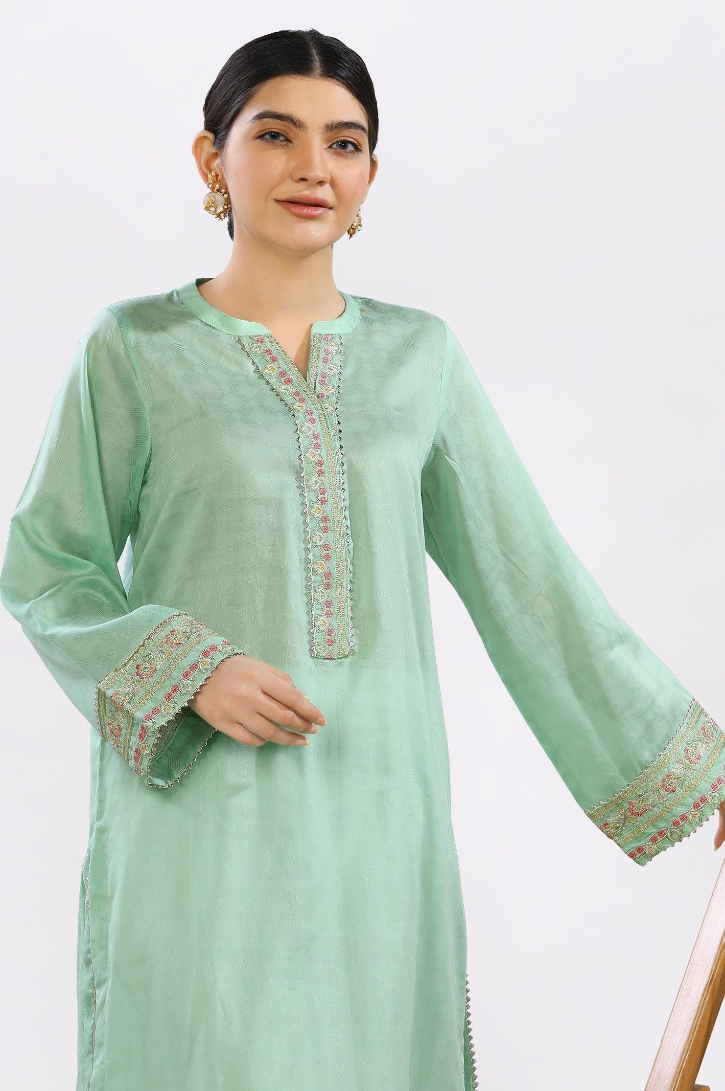 Embroidered Light Green Kurti From Diners